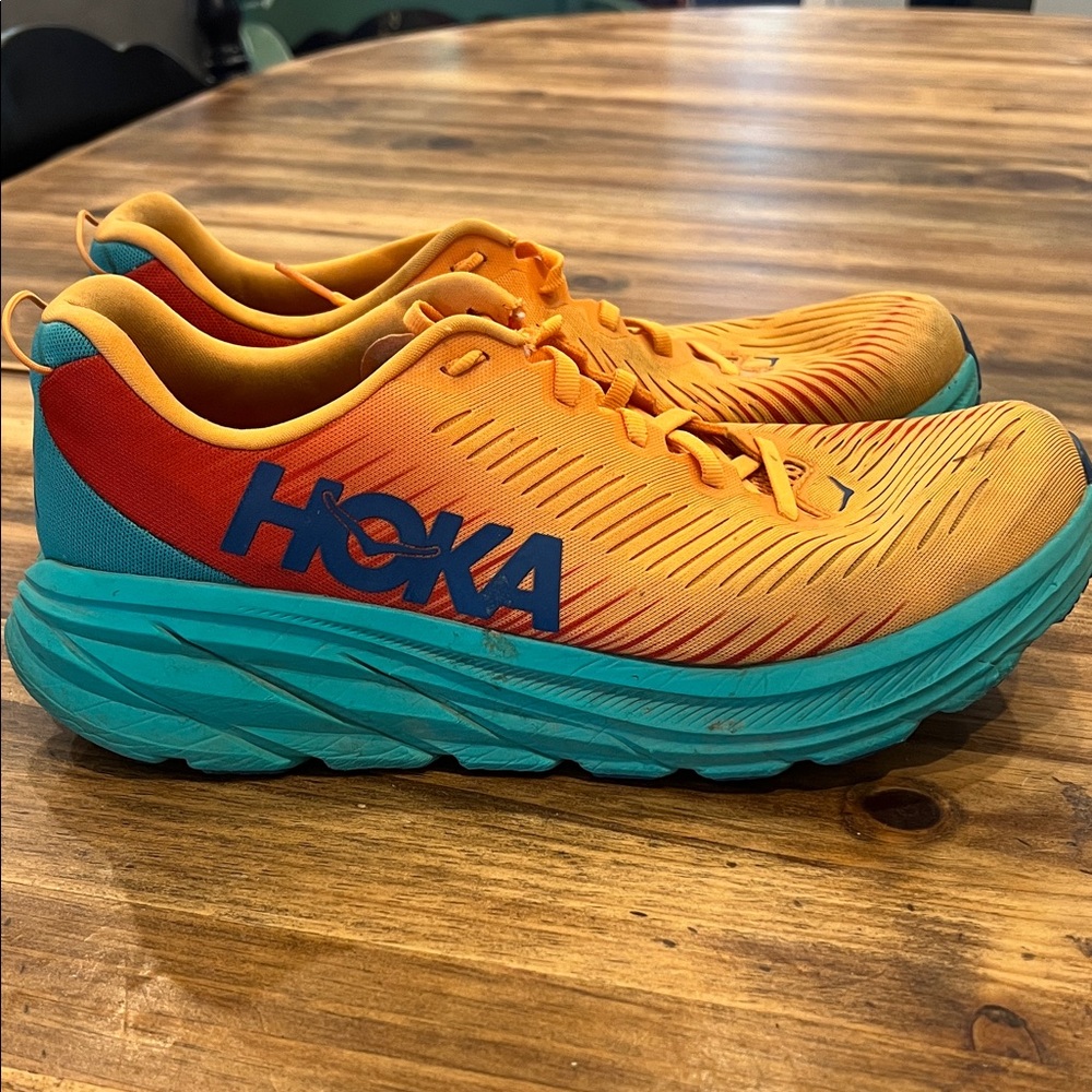 Hoka Vibrant Orange and Teal Sneakers
